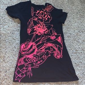 black shirt with pink floral design